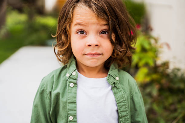 A portrait of a child at the park.