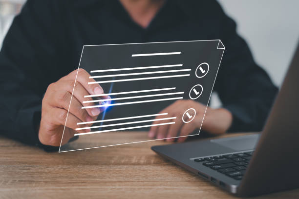 istock Business people sign and check electronic documents digital in virtual screens, Businessman use laptop and hold a pen marking on electronic document paperless office 1433141095