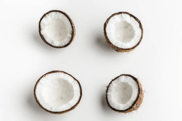 istock Ripe coconut pieces on white background, copy space 1433142664