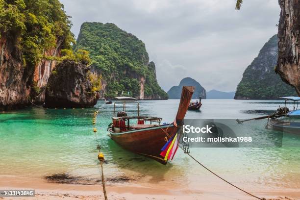 Long Tail Tourist Boats On Sea Shore Near Koh Hong Island In Krabi Province Stock Photo - Download Image Now