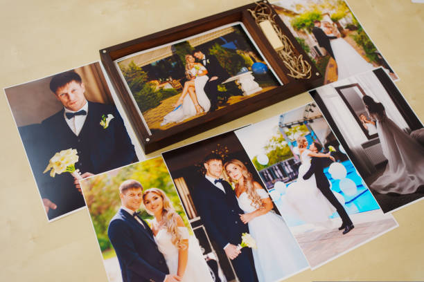 istock printed wedding photos and a wooden box with a flash drive. 1433151239