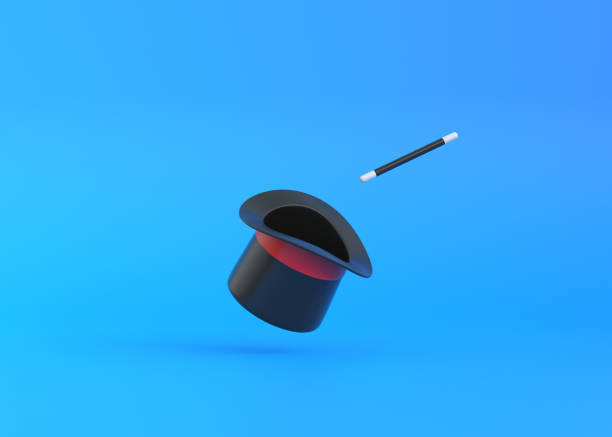 istock Magician hat with red ribbon and magic wand on a blue background 1433151251