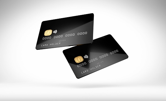Black glossy credit or smart card samples with emv chip on white background
