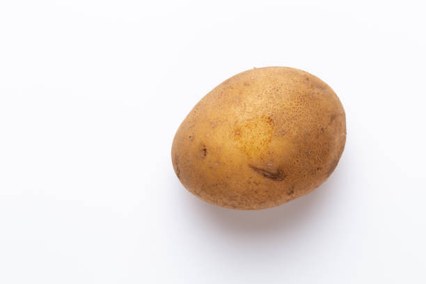 istock Potatoes isolated on white background. Flat lay. Top view. 1433163246