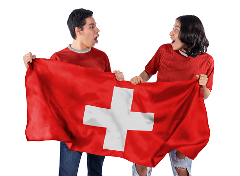 Happy Couple man and woman soccer fans with red jersey flag of Switzerland country on white background.