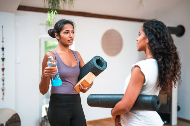 istock Fit Young Multiracial Women Talking After A Pilates Class 1433168580