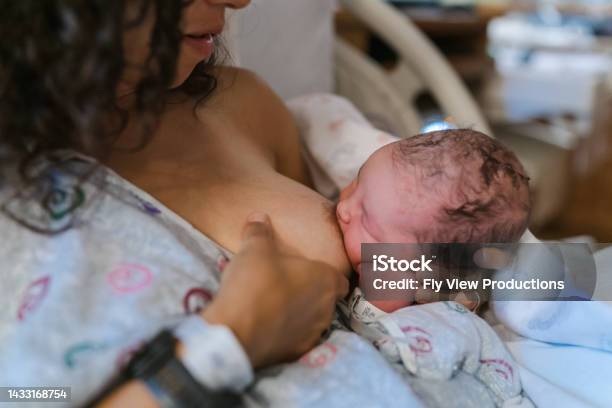Newborn Baby Breastfeeding At The Hospital Stock Photo - Download Image Now - Breastfeeding, Newborn, Hospital