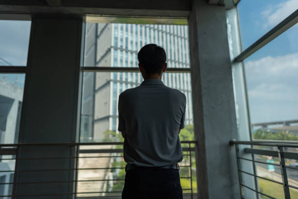 istock business man standing by the window admiring the scenery 1433171512