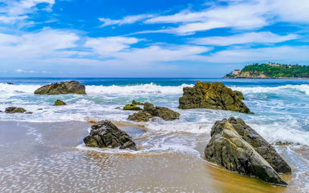 istock Extremely huge big surfer waves at beach Puerto Escondido Mexico. 1433173243