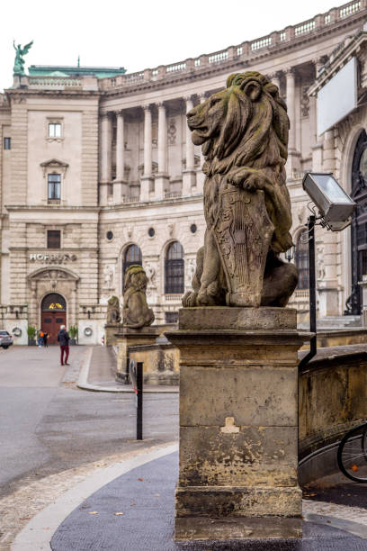 istock Statue of a lion with a shield at National Library, Vienna, Austria 1433175070