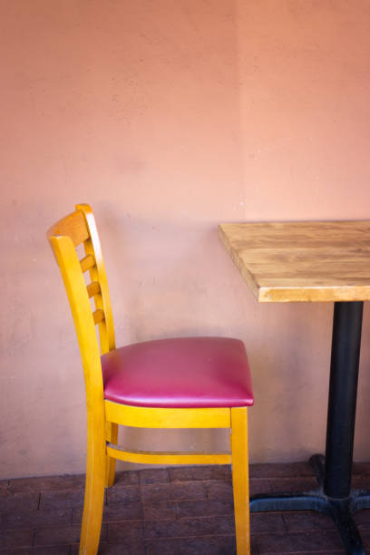 istock Santa Fe, NM: Old-Fashioned Sidewalk Cafe Furniture, Adobe Wall 1433175276