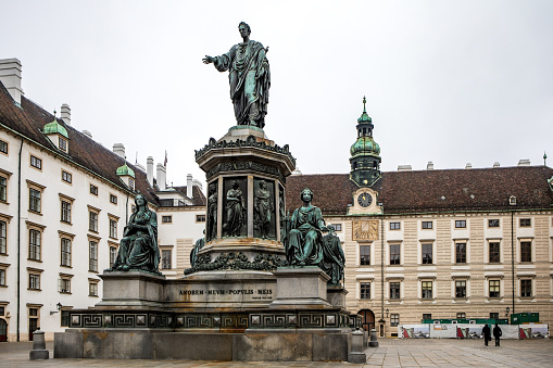 Beautiful view of Kaiser Franz I Monument in the courtyard of Hofburg Imperial palace, Vienna, Austria. Sculpture in 1846 by Pompeo Marchesi, Italian sculptor.