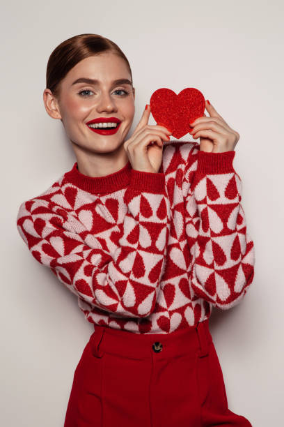 istock Beautiful emotional woman holding present box 1433179317