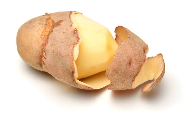 istock peeled raw potatoes close-up, the object is isolated on a white background 1433179514