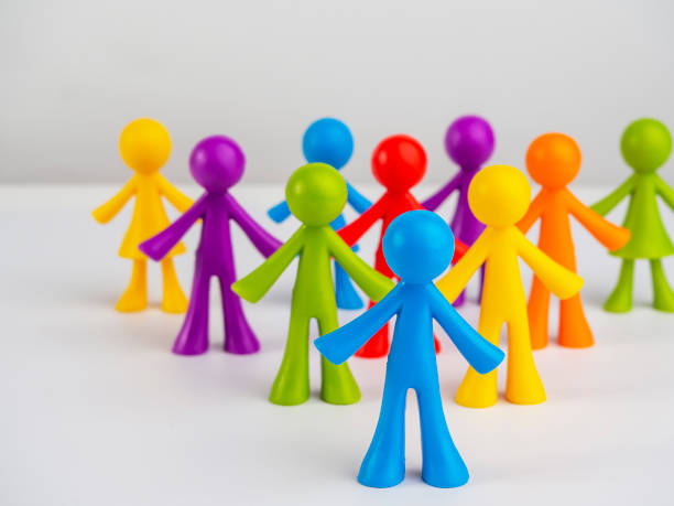 istock Colorful little people on a bright background. 1433186257