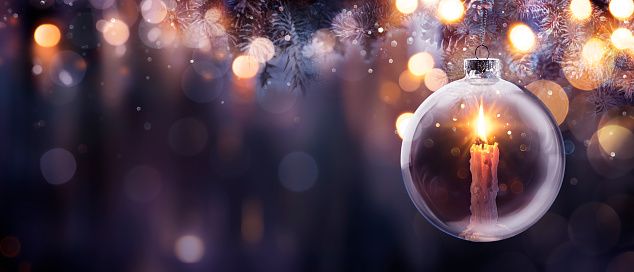 Christmas Hope - Advent Candle With Star Flame In Ball Hanging Tree With Defocused Bokeh Light - Prayer Concept