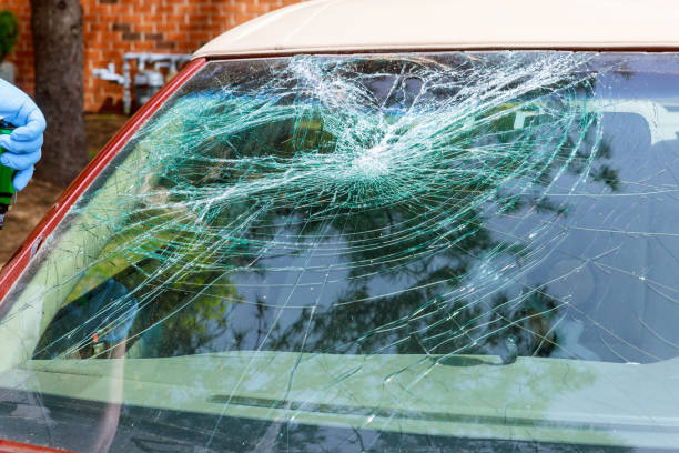 istock After an accident, special workers from an automobile service company replaced the windscreen near home 1433191715