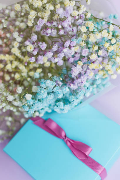 istock Rainbow gypsophila bouquet and gift box 1433191783