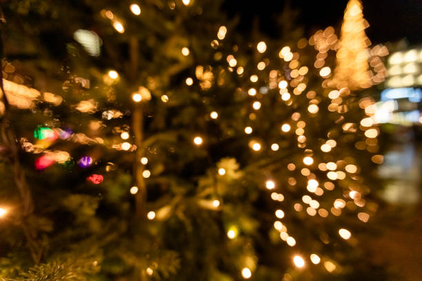 Blurred Christmas background for template. New year concept, unfocused lights and copy space. Abstract bokeh, close-up photography