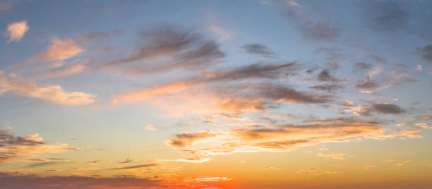 istock Blue sky with golden clouds sunset background 1433192367