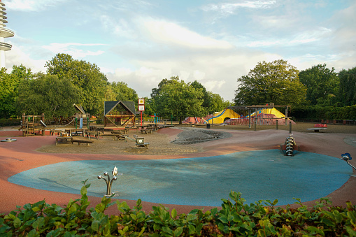 Children's playground in the garden Planten un Blomen in Hamburg  early at morning in September  or summer