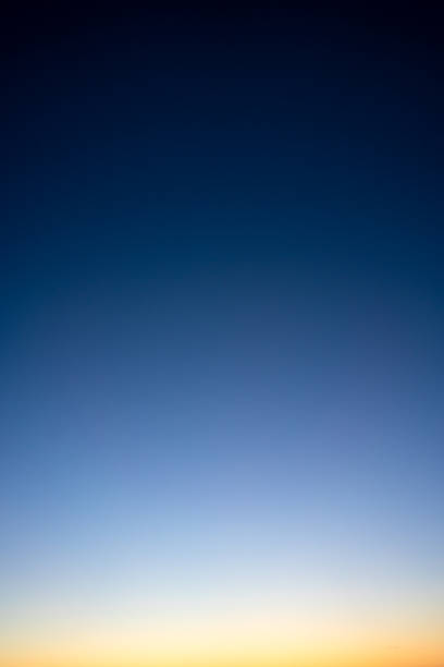 Above the horizon at dusk stock photo