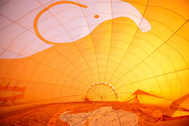 istock Inside of orange hot air balloon with drawn elephant. 1433196724