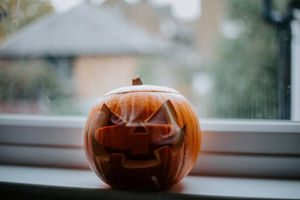 Halloween, orange pumpkin with smoke