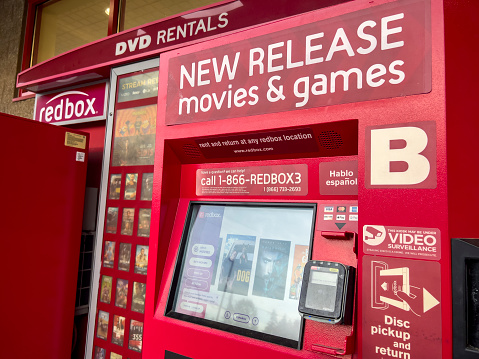 Everett, WA USA - circa September 2022: Angled, selective focus ona RedBox dvd and video game rental kiosk.