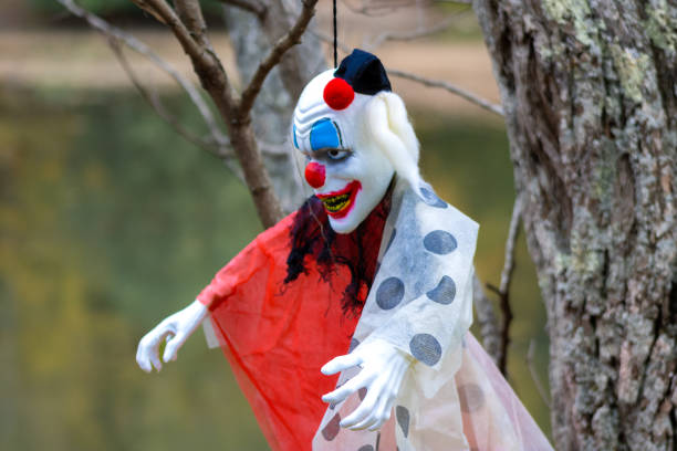 istock Close-up view of clown decoration hanging from tree 1433205775