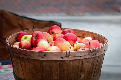 a basket filled with fresh apples