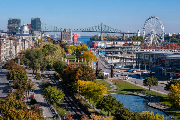 Aerial view of the Old Port of Montreal, with Ferris Wheel, Jacques Cartier Bridge and Bonsecours Market stock photo