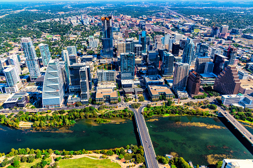 Aerial view of the skyline of Austin, Texas along the banks of the Colorado River from about 2000 feet in altitude during a helicopter photo flight.