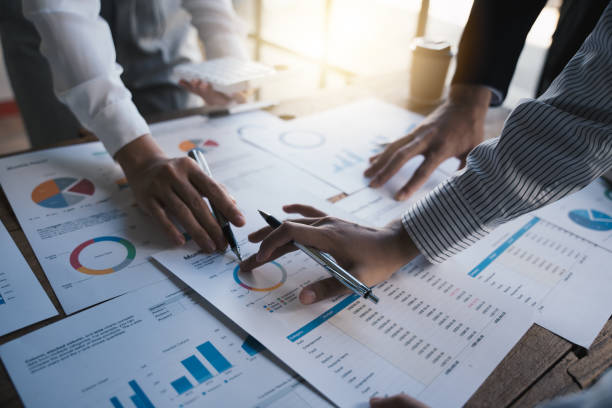 istock Business people making report, calculating using calculator and checking montly budget, Audit concept. 1433233111