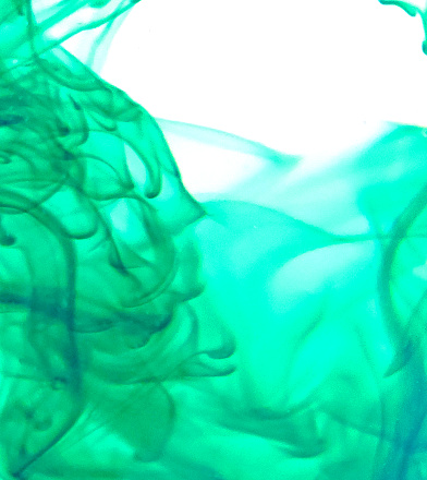 Green Swirly Background - green food dye swirling in water