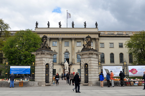 Berlin, Germany- April 22: Berlin is the capital of Germany and a city surrounded by forests and lakes. Here is the statue of Marx and Engels in the campus of Humboldt University.