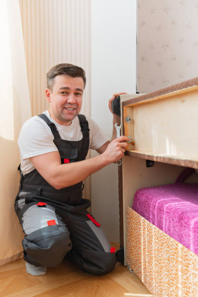 istock a man assembles furniture. carpenter and handyman services 1433248107