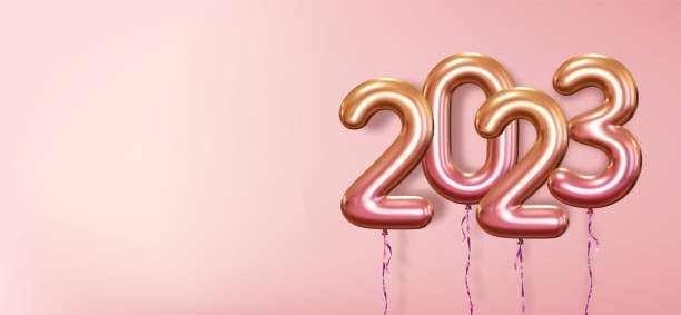istock 2023 Realistic Helium Balloons Numbers on Pink Background. 1433251942