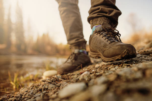 istock men's footsteps on the beach of river 1433253941