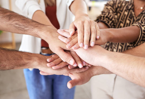 istock Teamwork hands, motivation and team building trust with mission for growth vision, partnership deal and goals support together. Circle to celebrate global community, group collaboration and diversity 1433264484