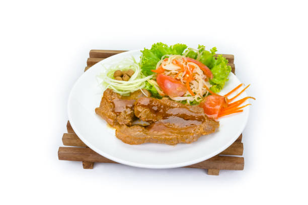 istock Grilled steak meat with vegetable salad on white background 1433269745