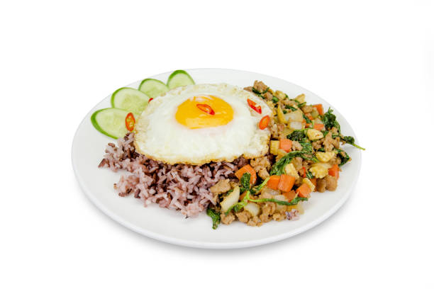 istock Fried egg with stir-fried minced pork and basil  isolated on white background,clipping path,Thai food 1433271016