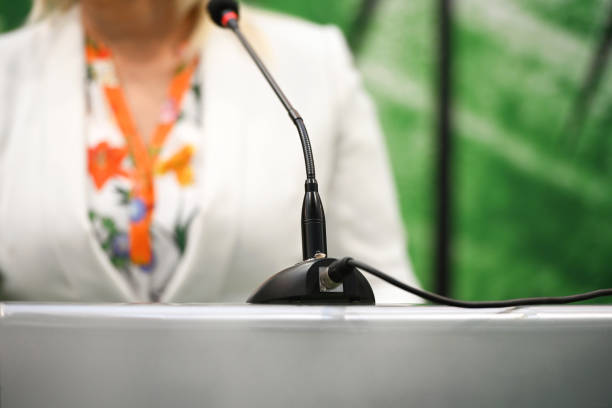 istock Female politician speaking at a conference 1433272147