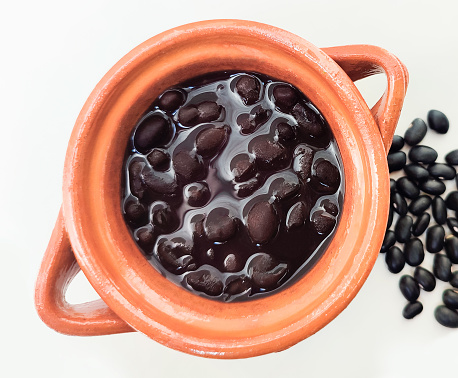 black beans cooked in clay pot latin american food