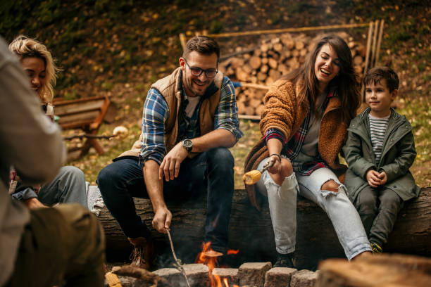 istock Family with child having a campfire 1433274865