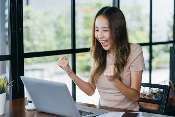 istock Freelance Freelancer asian woman smiling her working with laptop computer and smartphone for working job at workspace. small business with freedom lifestyle concept. 1433280818