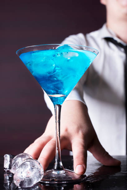 istock Bartender serving cocktails at the night club. 1433282656