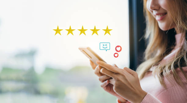 istock Customer satisfaction concept. businessman using a smartphone to choose 5 stars. Excellent business rating experience. Satisfaction Rating, good and impressive 1433282914