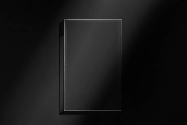 istock acrylic glass frame with light and shadow black background 1433284250