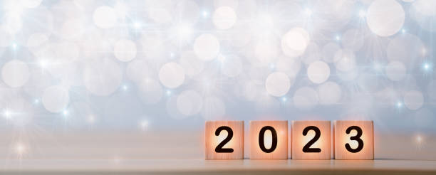 istock 2023 Happy New Year, Celebration, Background, Goal, Target, Action, Plan, Idea, Inspiration Concept. 2023 on wooden cube blocks with blur, bokeh background. Concept of Merry Christmas, Happy New Year 1433288736